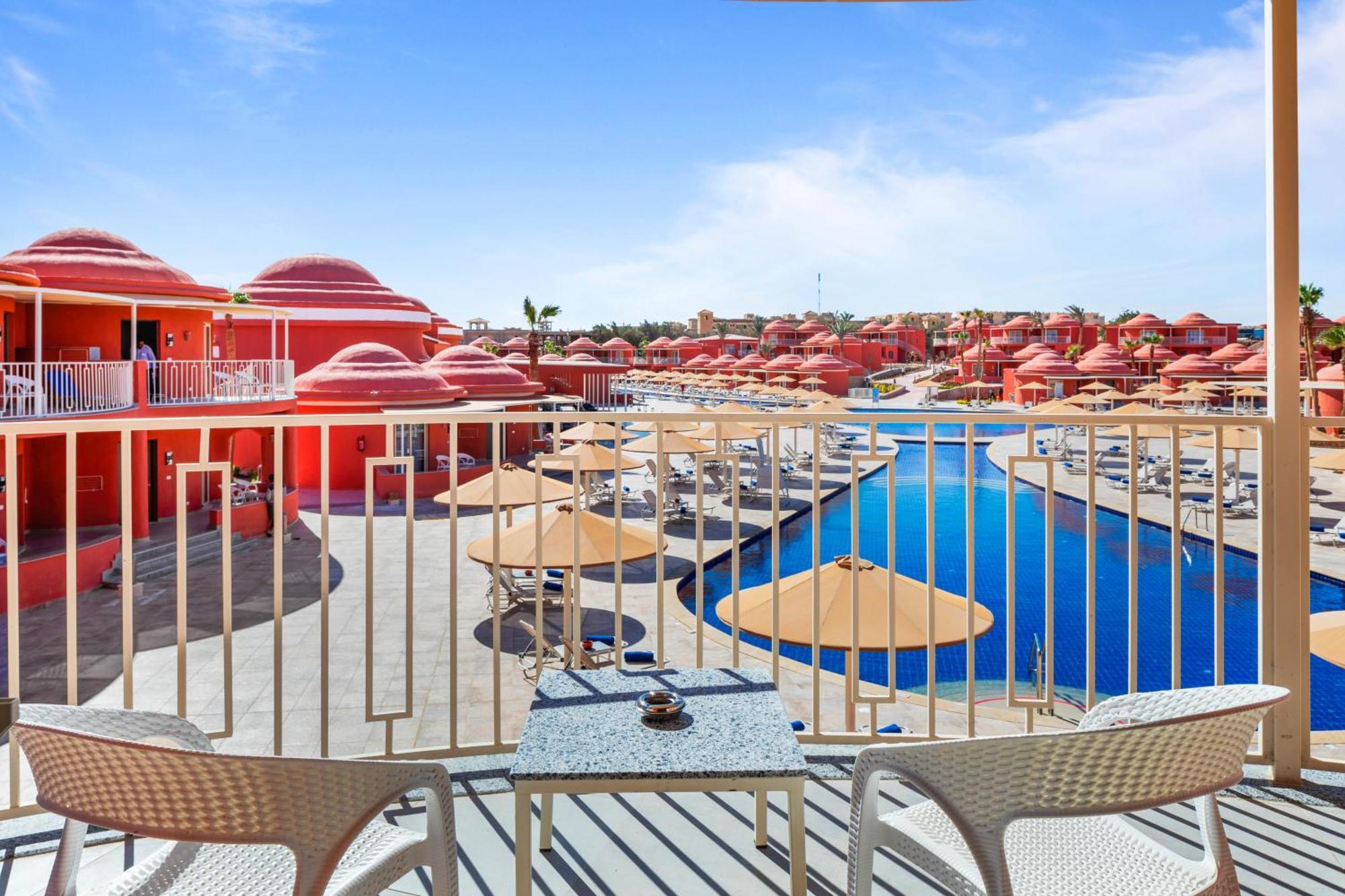 Pickalbatros Laguna Club Resort Sharm El Sheikh Dış mekan fotoğraf View of the pool at the Hilton Sharm El Sheikh